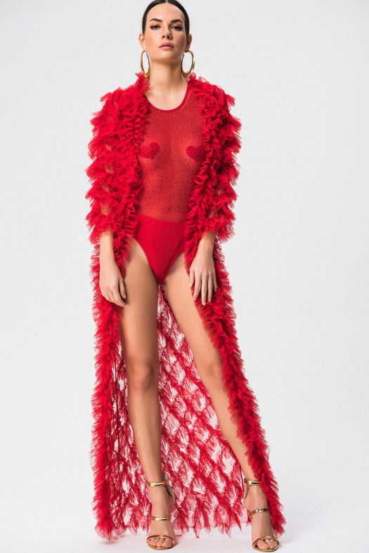 Chiffon ruffle duster paired with a pair of your favorite jeans or the latest swim wear is sure to have you looking chic.